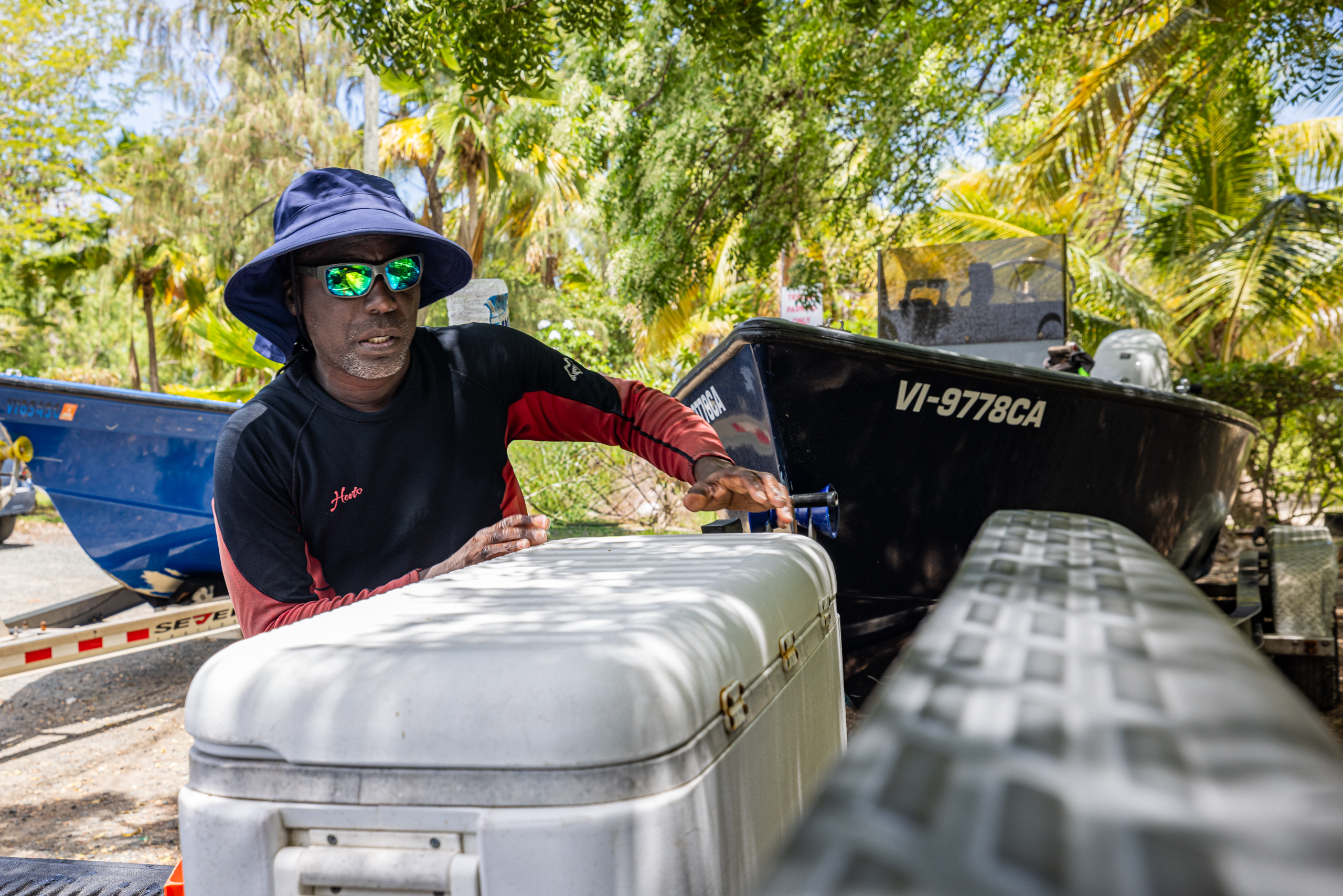 Commercial fishermen Bobby Thomas, loads his catch from the day in the back of his truck. Bobby has been fishing St. Croix waters for 30 years.