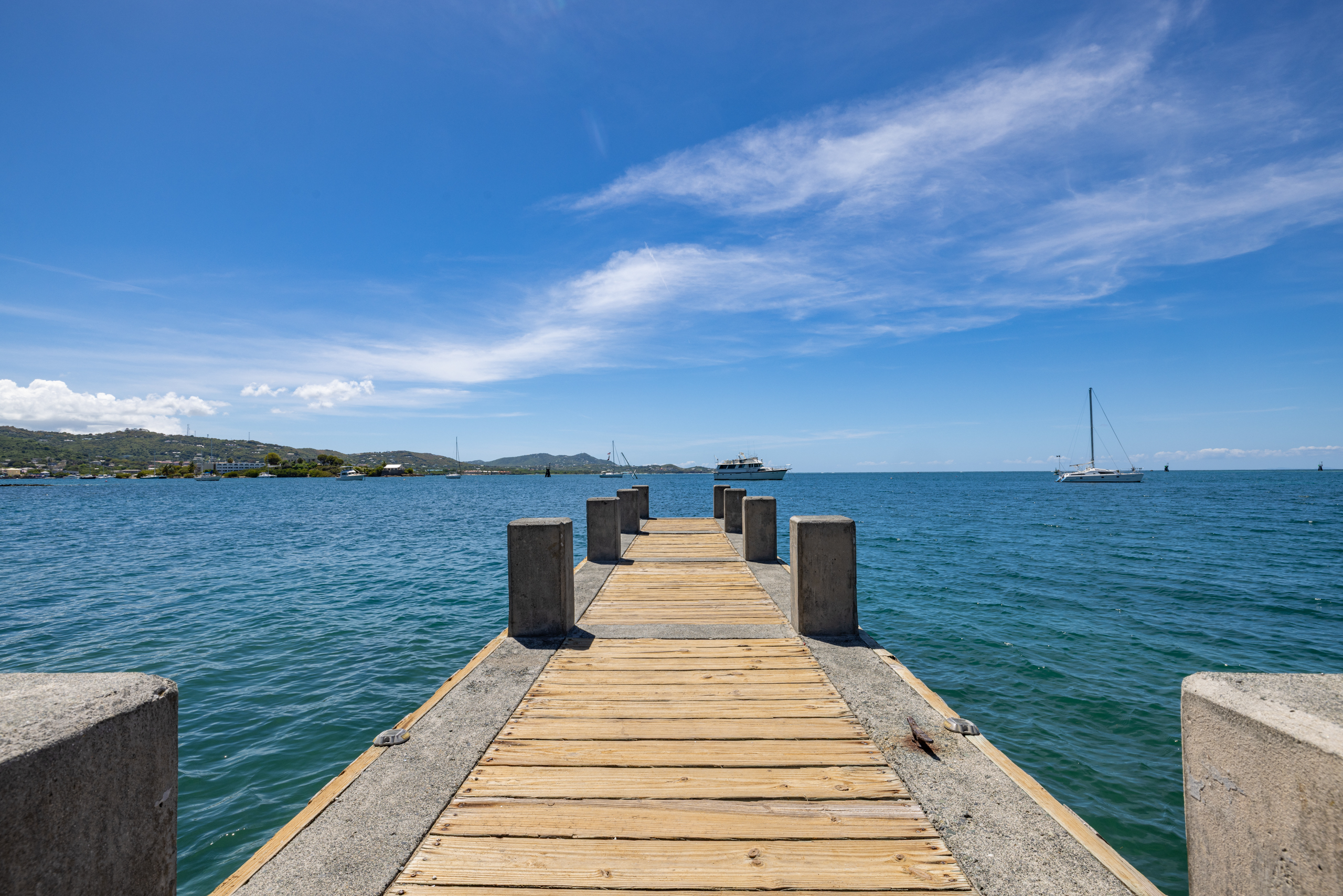 The recently built dock provides an easy access point for dropping off or picking up boat passengers and a location where locals can fish from shore.